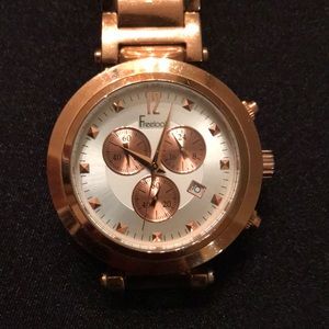 Freelook rose gold watch